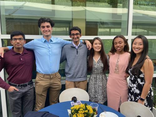 Duke students standing shoulder to shoulder posing for picture. 