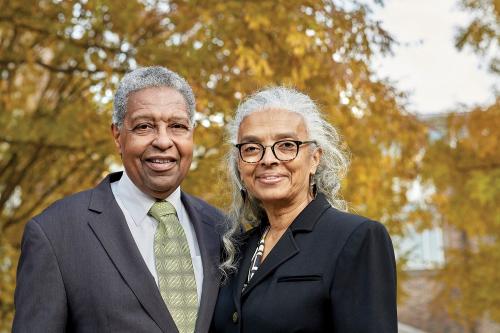 Two people smiling