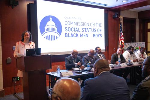 Panel of speakers at a table